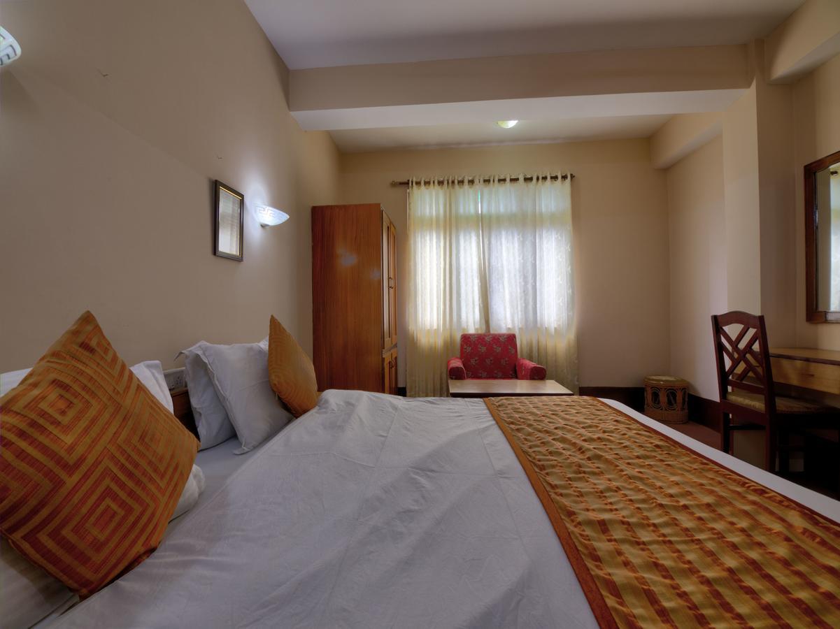 Oyo 13521 Sudhriti Hotel Siliguri Luaran gambar