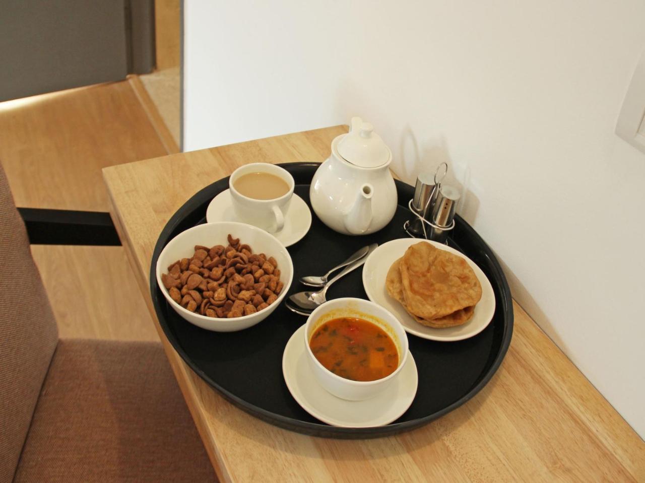 Oyo 13521 Sudhriti Hotel Siliguri Luaran gambar
